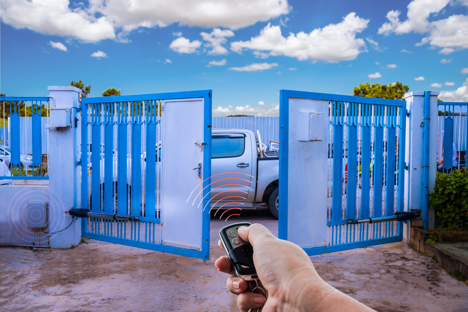 man used hand remote control to open swing gate door by motor au | rigid security | rigid security